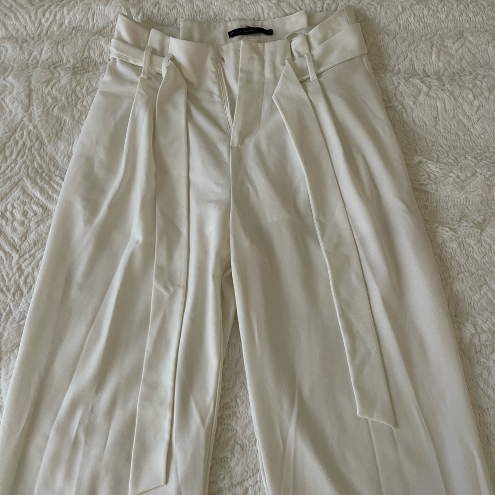 High waisted, wide legs white pants.